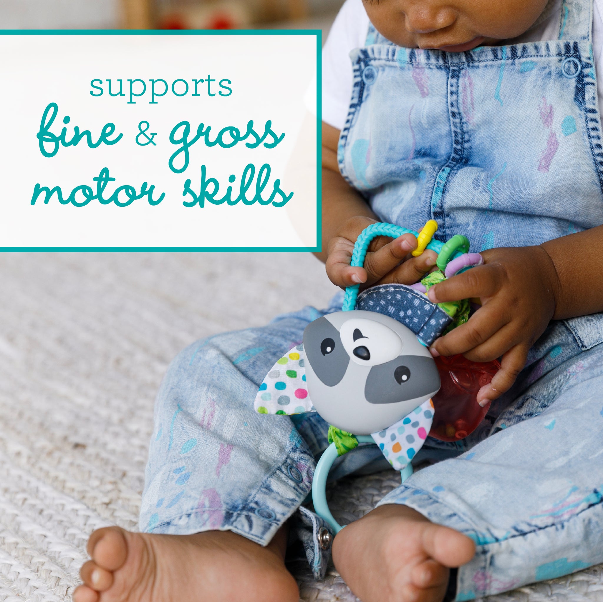 Jingle Charms Rattle Raccoon – Infantino