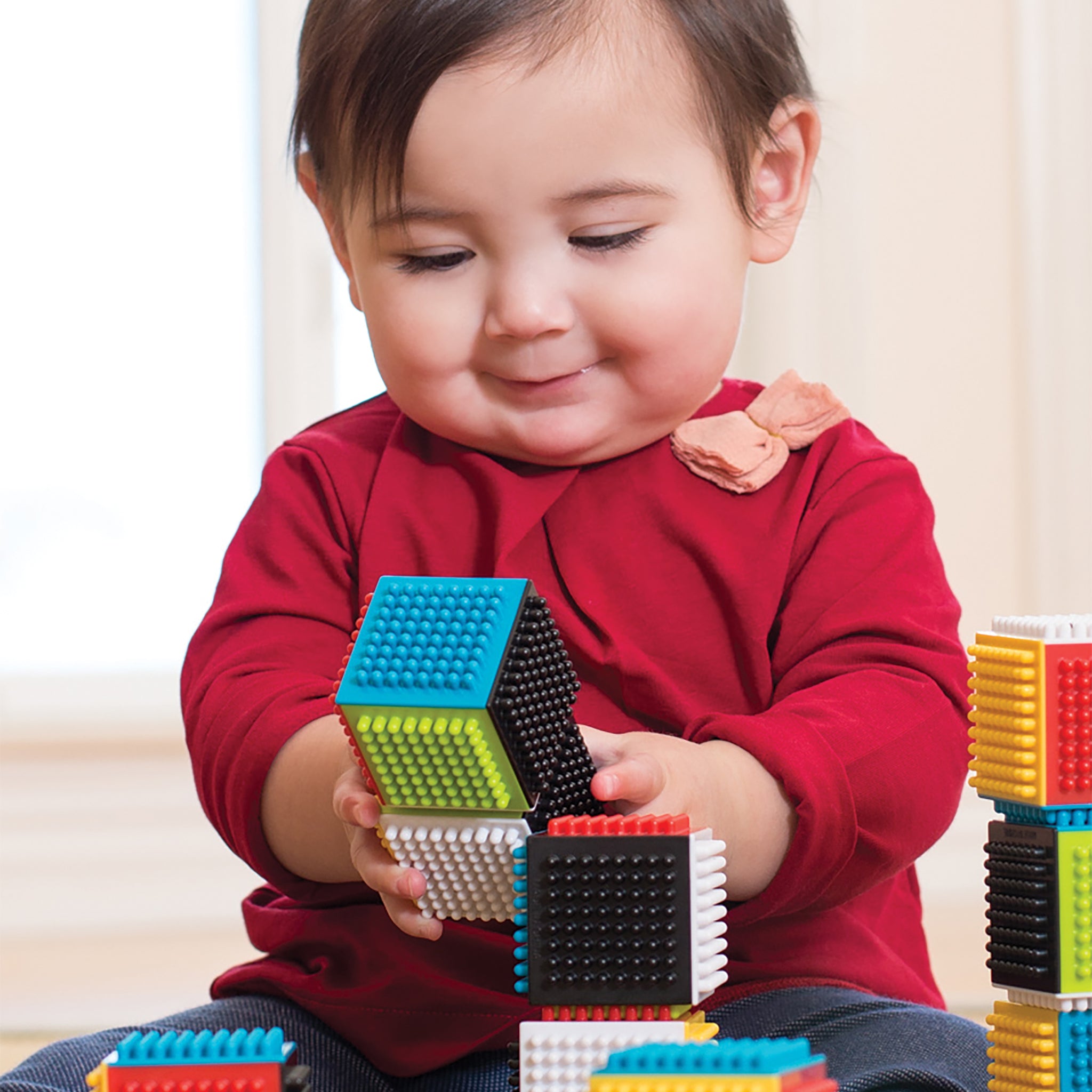 Press & Stay Sensory Blocks™ – Infantino